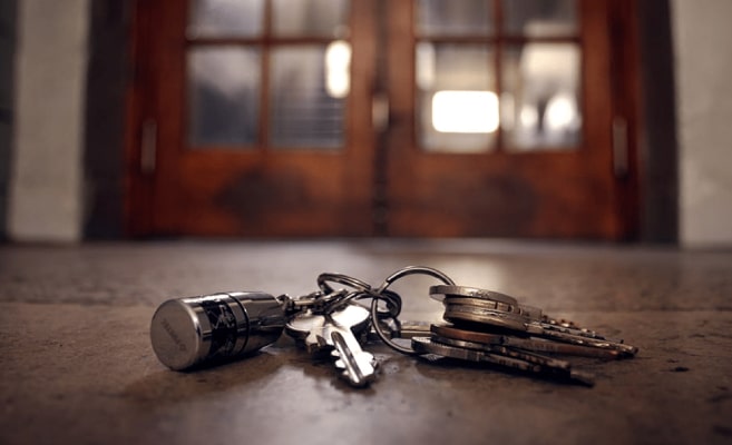 Lost keys on the floor in front of building entrance